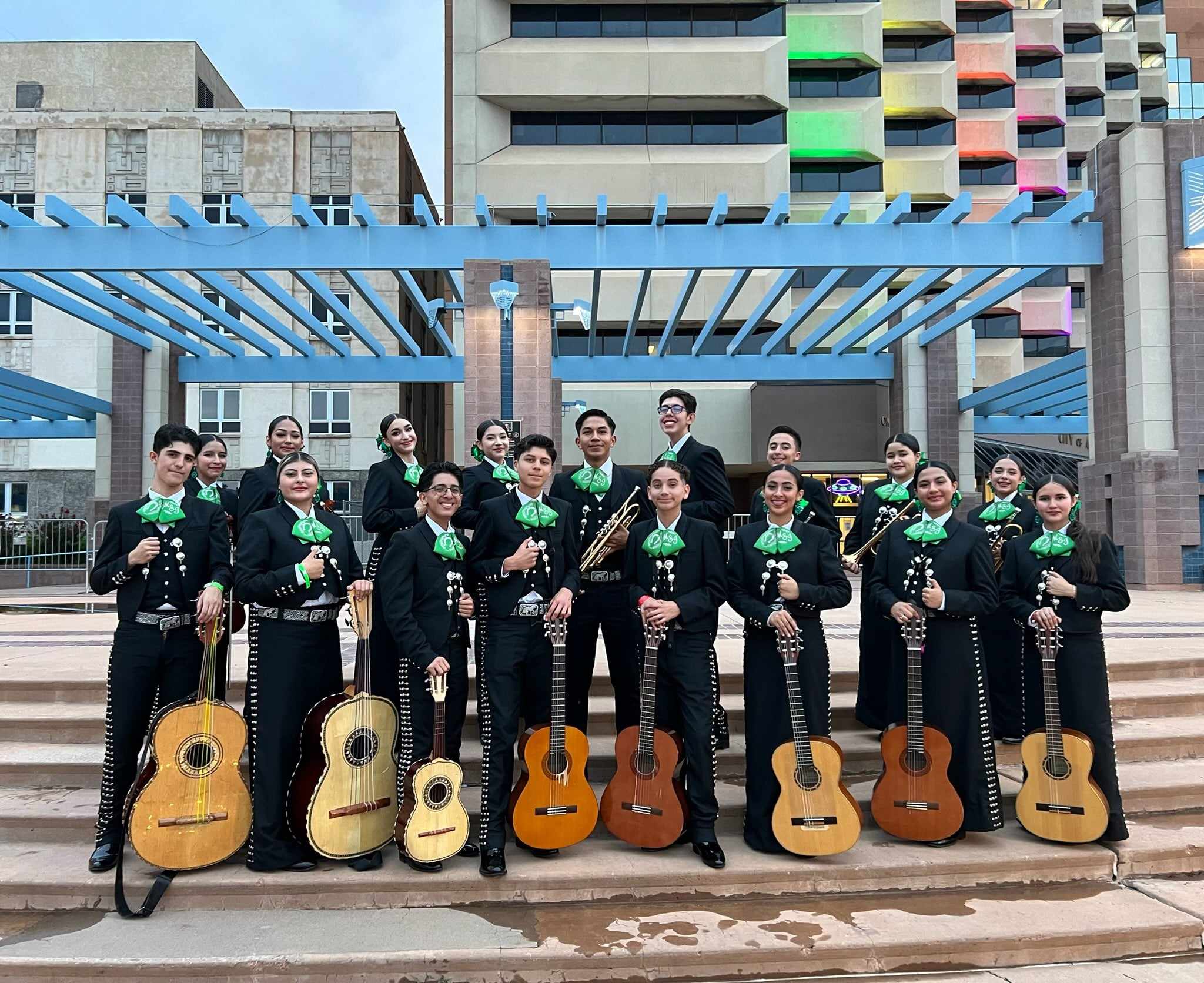 Mariachi San Jose from Albuquerque High School wearing mariachi attire with shiny green bowties