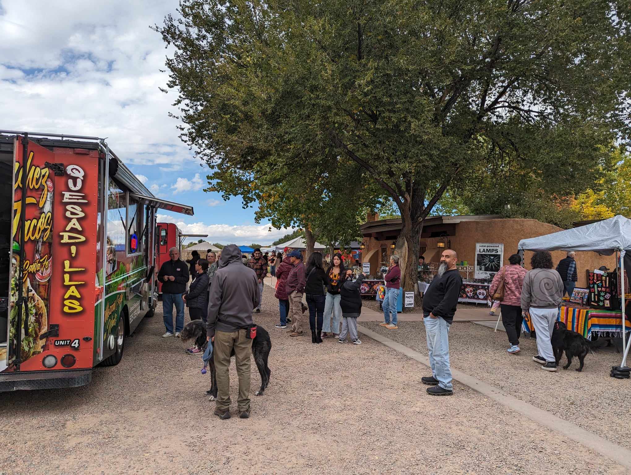 Food Trucks with people waiting for their food 